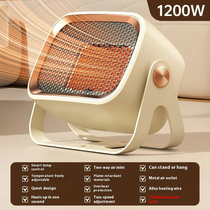 White desktop ceramic fan heater with rotatable base on a wooden table.