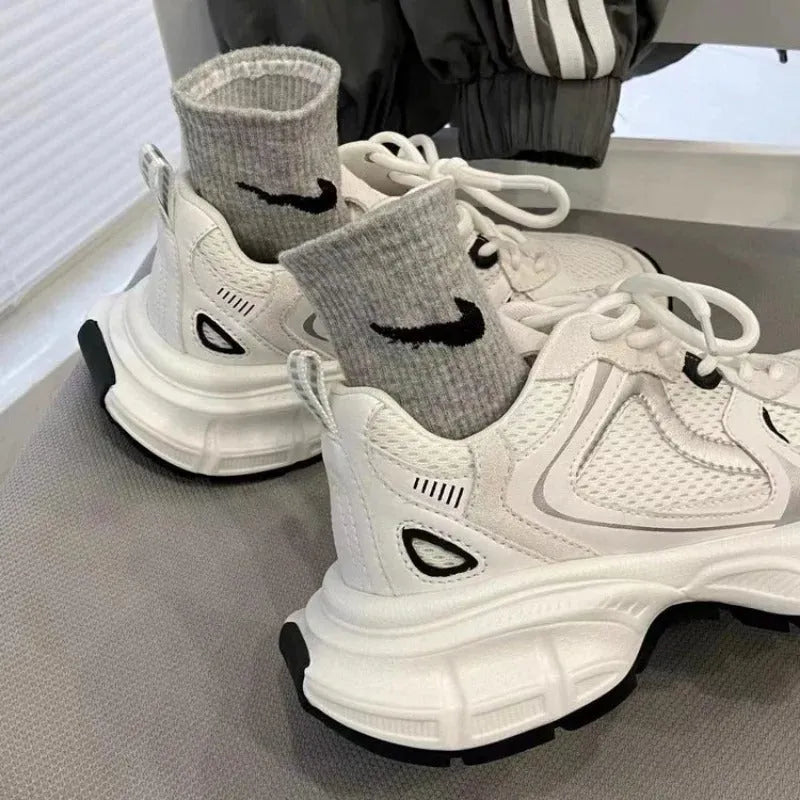 Polar Wave beige mesh platform sports shoes with a wedge heel and lace-up front.