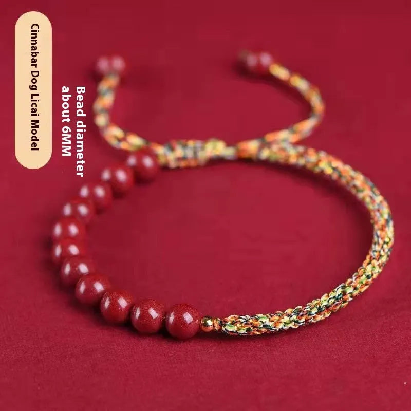 Braided rope bracelet with cinnabar beads in 8mm diameter and wine red colour