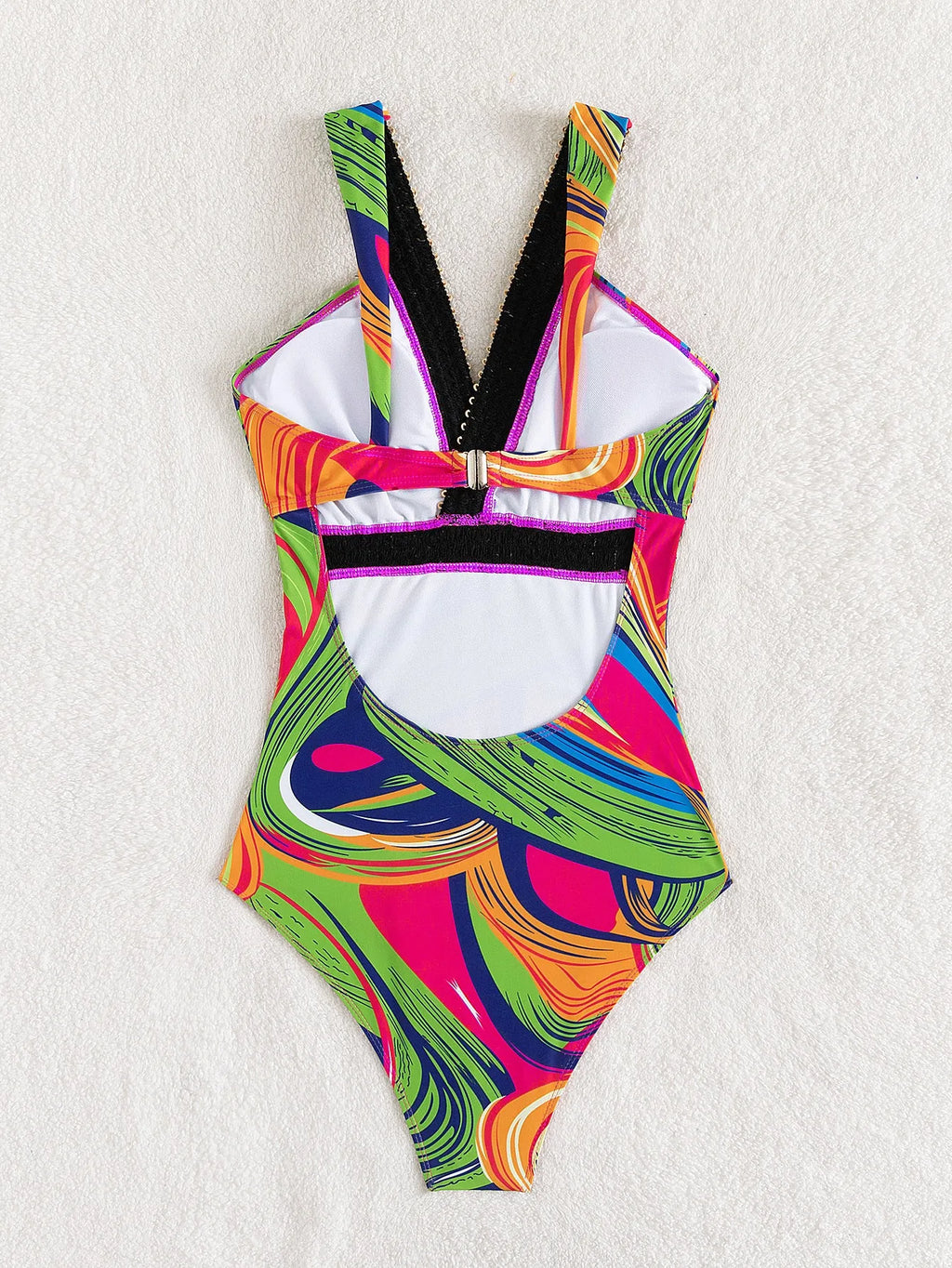 Women's deep V spaghetti strap one-piece swimsuit in polyester with printed pattern, available in multiple colours