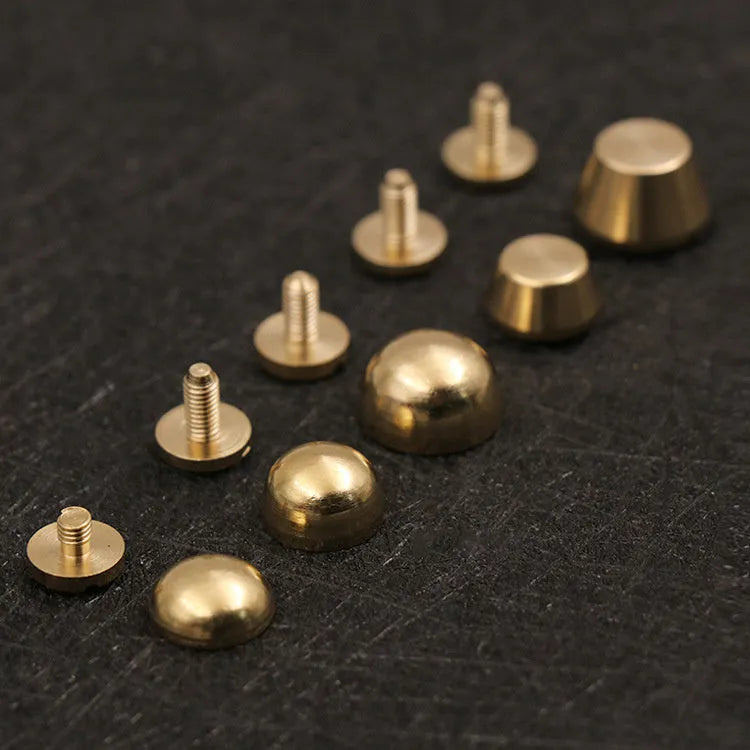 Brass decorative buckle with antique foot nail design in four size variations