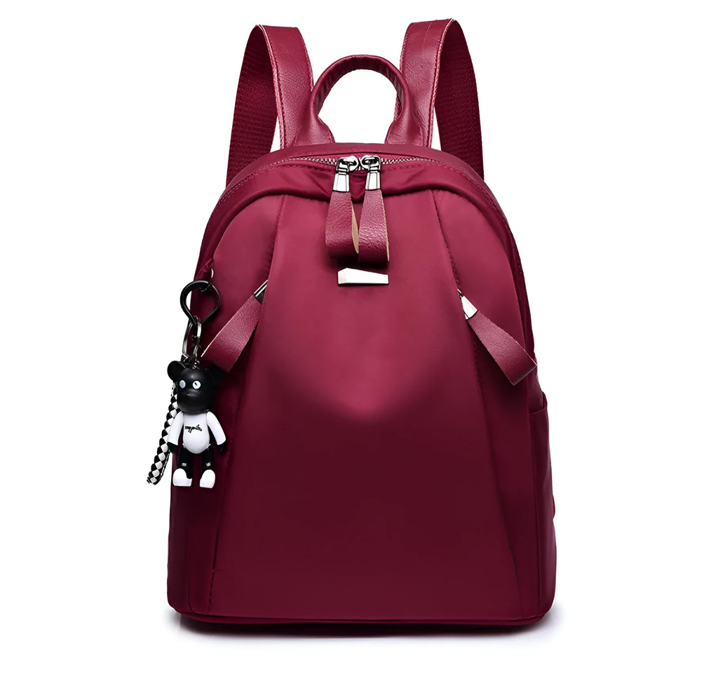 Medium size wine red Oxford cloth rucksack showing internal mobile phone and ID organisation pockets