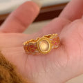 Escape K227 pink crystal enamel geometric open ring in gold-plated copper.