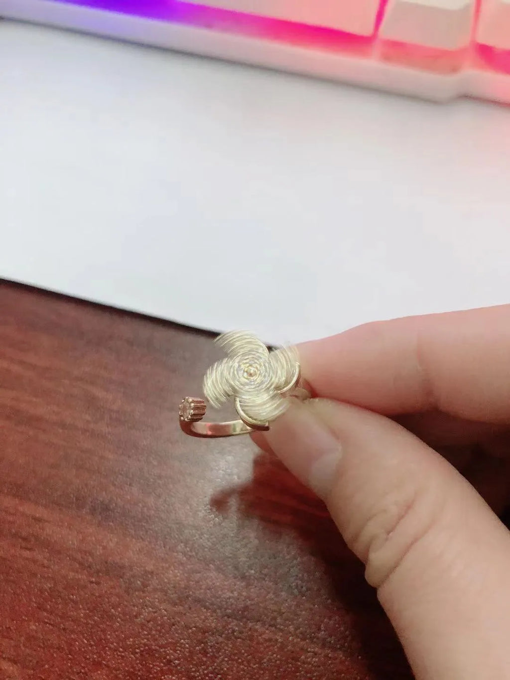 Copper rotating ring with windmill design in gold or silver electroplated finish
