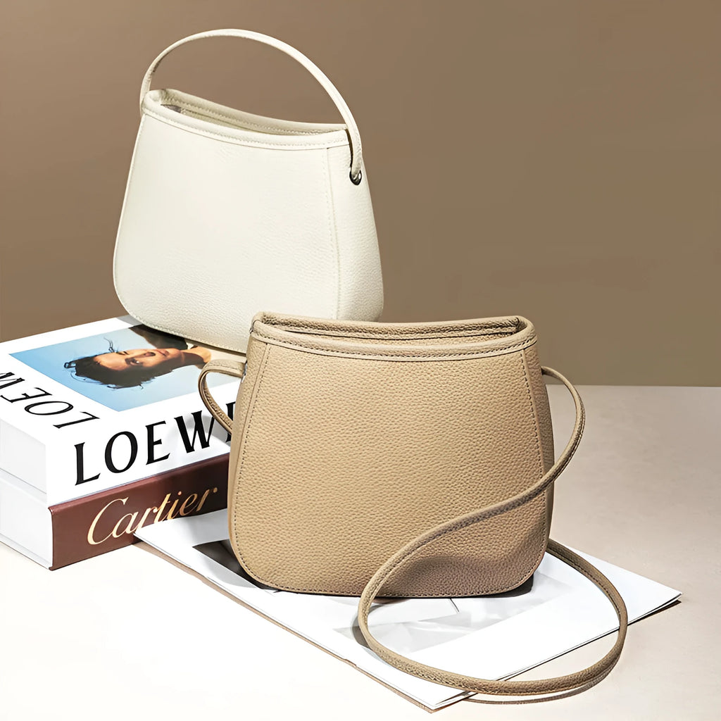 Women's genuine cowhide messenger bag in beige with soft surface leather, square vertical shape, and removable handle