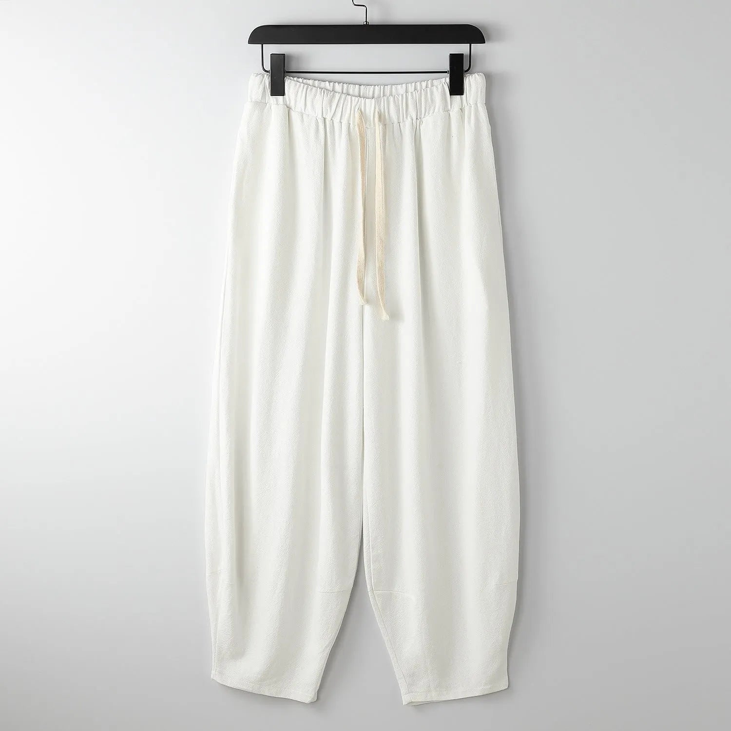 Linen loose ankle-tied harem pants for overweight men in khaki, elastic waist, tapered leg