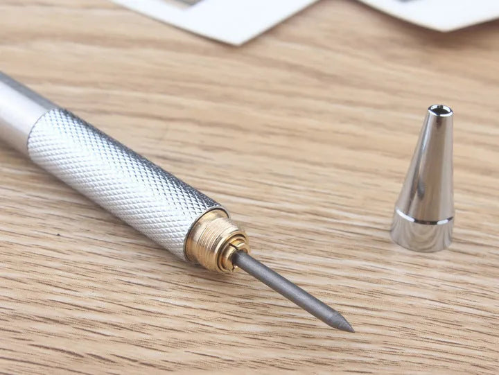 Silver metal automatic mechanical pencil with various lead size options shown.