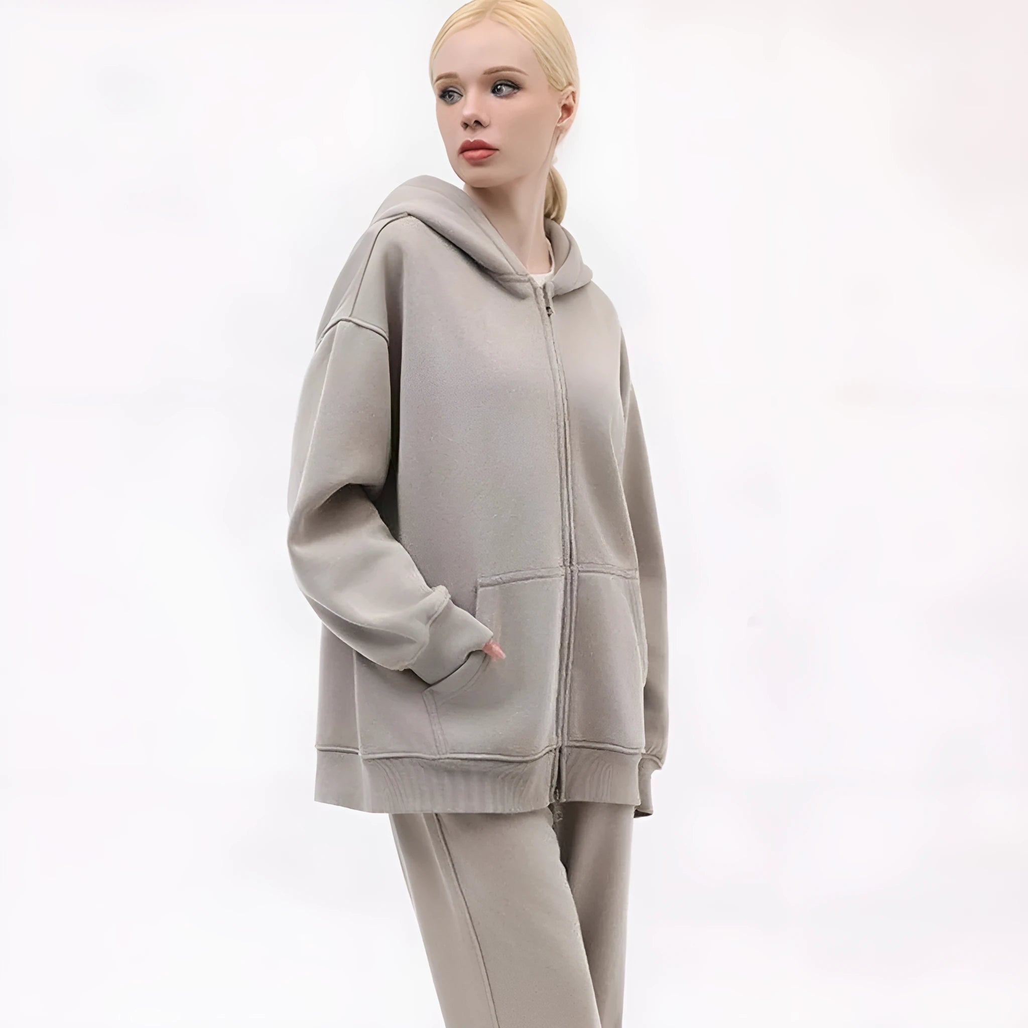 Fleece-lined distressed hooded cardigan sweater for women in dark grey with drop-shoulder sleeves and size patch pockets