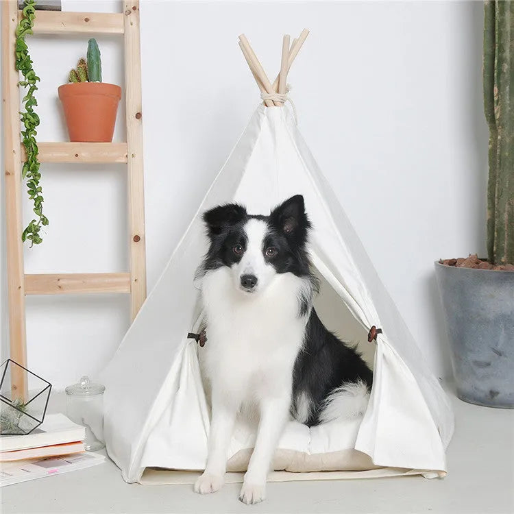 Wooden cat kennel with white canvas pad in medium size.