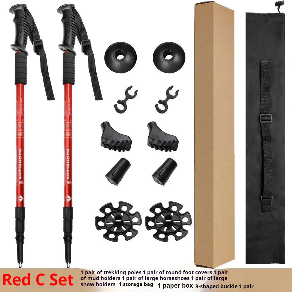 Aluminium alloy trekking poles adjustable 65-135cm with mud supports and snow holders on a mountain trail