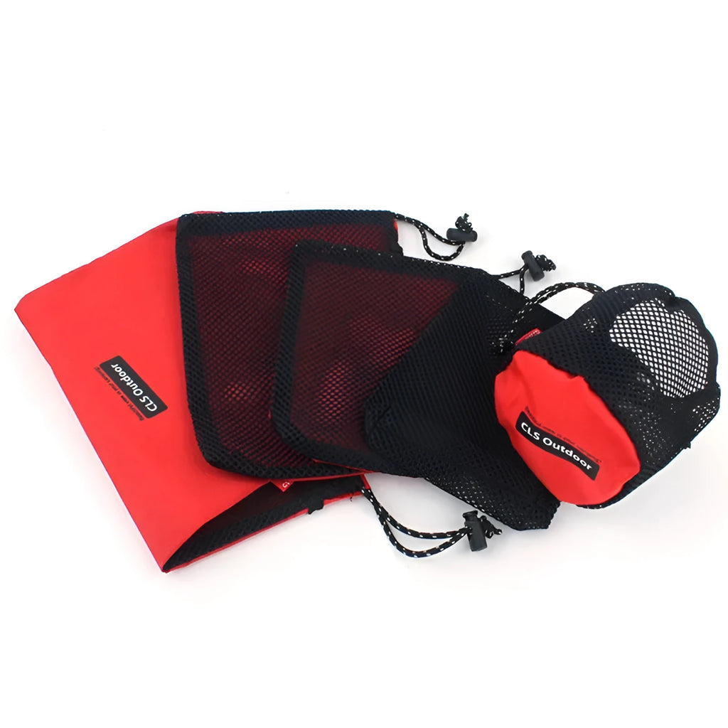 Five red outdoor storage bags with mesh panels and zipper closures for travel organisation