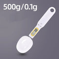 Household electronic measuring spoon scale with ABS plastic body and digital display on a kitchen surface