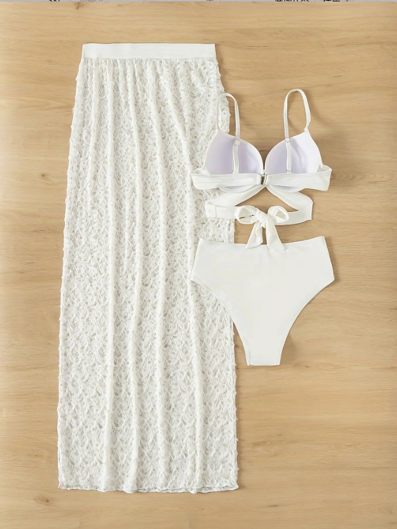 White three piece swimsuit set with gathered long skirt, top, and briefs made from nylon fabric for swimming and wading