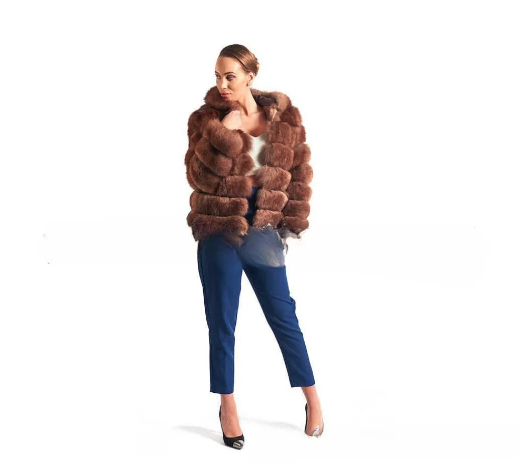 Women's loose faux fur hooded coat in street style, shown in medium length