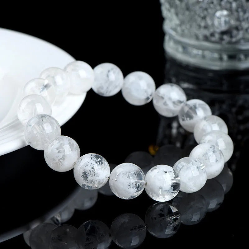 Crystal bracelet with blizzard snowflake pattern beads featuring Ruyi and Xiangyun symbols in geometric shape
