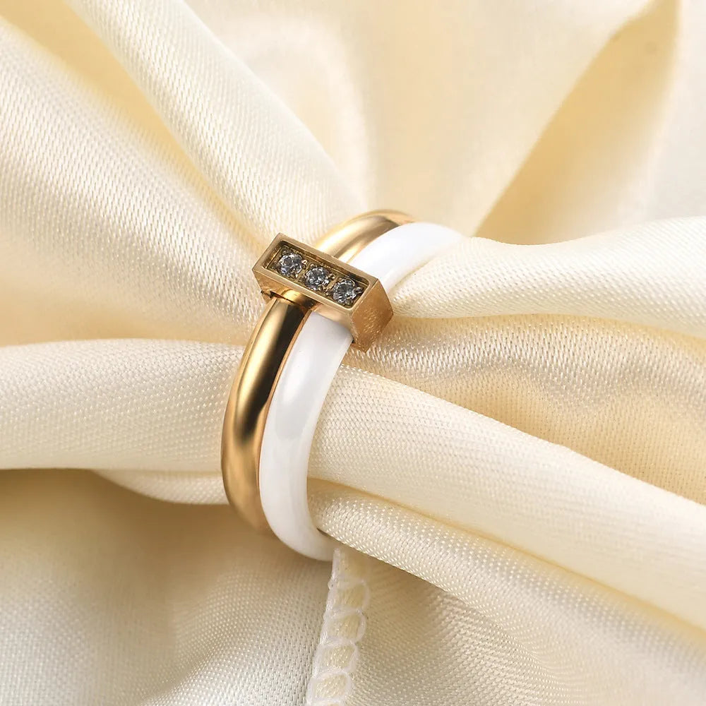 Geometric zirconium ceramic women's ring with glossy stitching in steel black or gold white finish