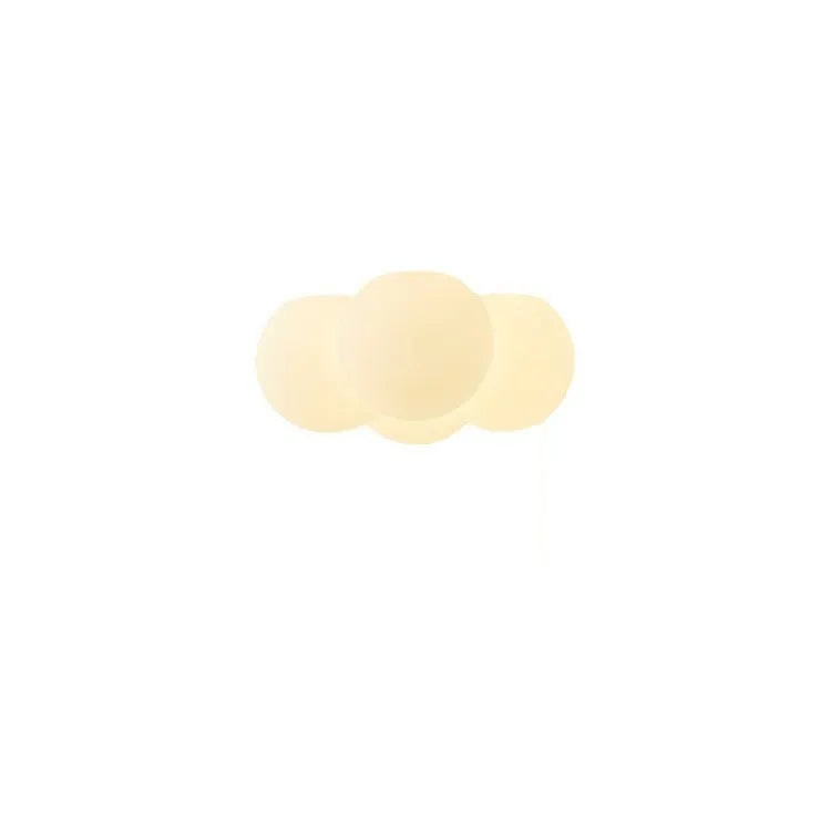 Modern minimalist cloud chandelier with tricolor light, 42mm diameter, ceiling mounted in a bedroom