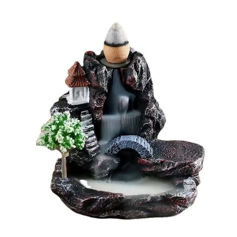 Creative ceramic backflow incense burner ornament in modern simplicity style with smoke cascading downwards