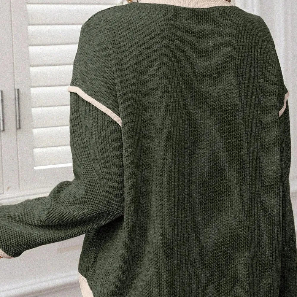 Drop shoulder loose knit top with four leaf clover pattern and contrast colour trim
