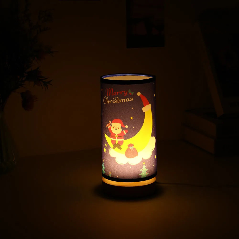 Moon Santa Claus design LED night light with bamboo base and USB plug.