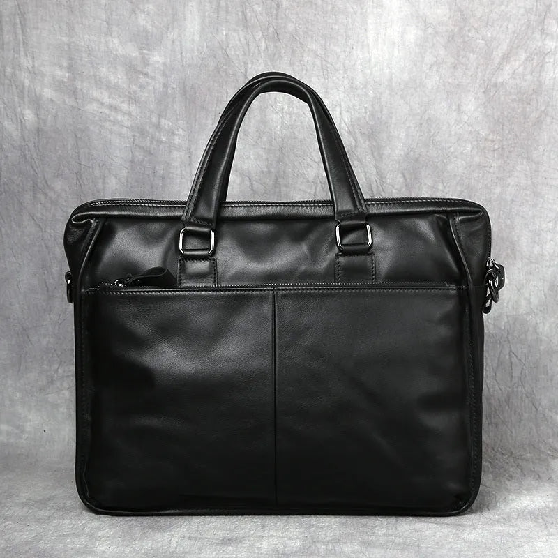 Black men's leather leisure briefcase with top layer cow hide, zipper closure, and shoulder strap