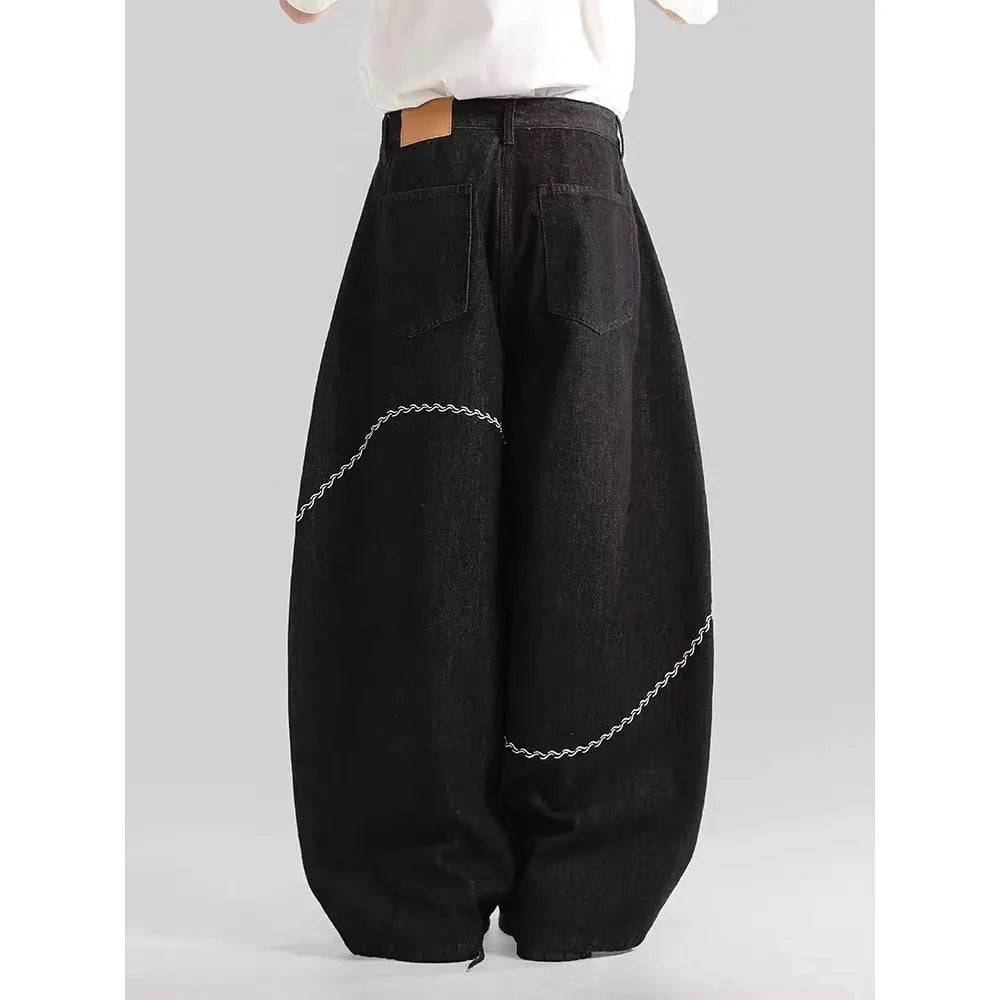 Black straight-leg denim trousers with mid waist and micro-elastic fabric