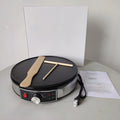 Black electric baking pan with non-stick surface and adjustable temperature knob, 30cm diameter