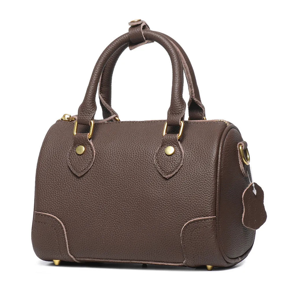 New handmade first layer cowhide Boston bag in brown yellow with sewing thread detailing, single shoulder strap, and open outer pocket
