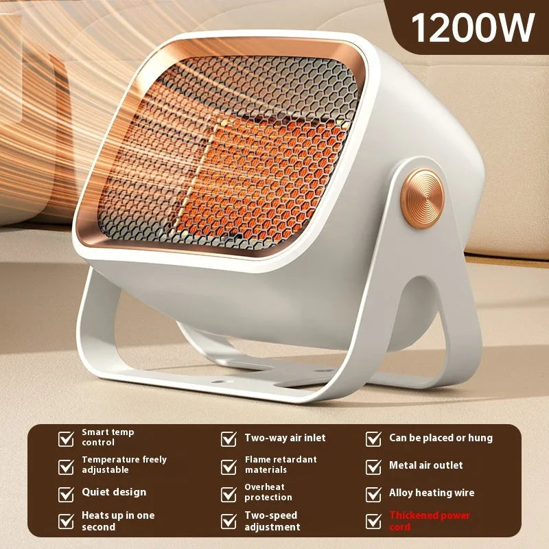 White desktop ceramic fan heater with rotatable base on a wooden table.