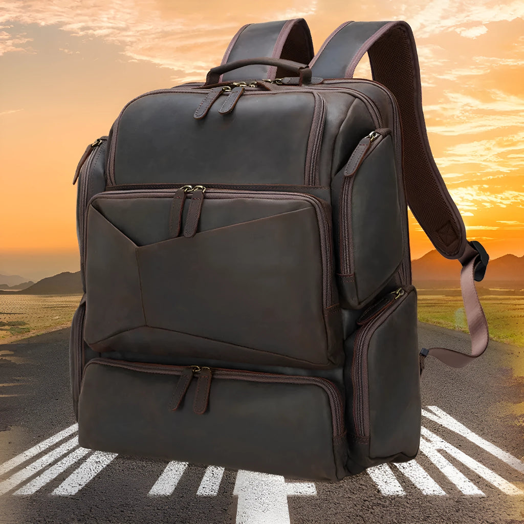 Dark brown retro leather backpack for 17-inch laptops with multiple compartments and shoulder straps