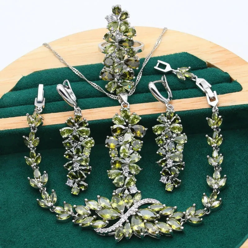 Retro floral jewellery set with necklace, bracelet, earrings, and ring in alloy with copper zircon details.