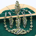 Retro floral jewellery set with necklace, bracelet, earrings, and ring in alloy with copper zircon details.