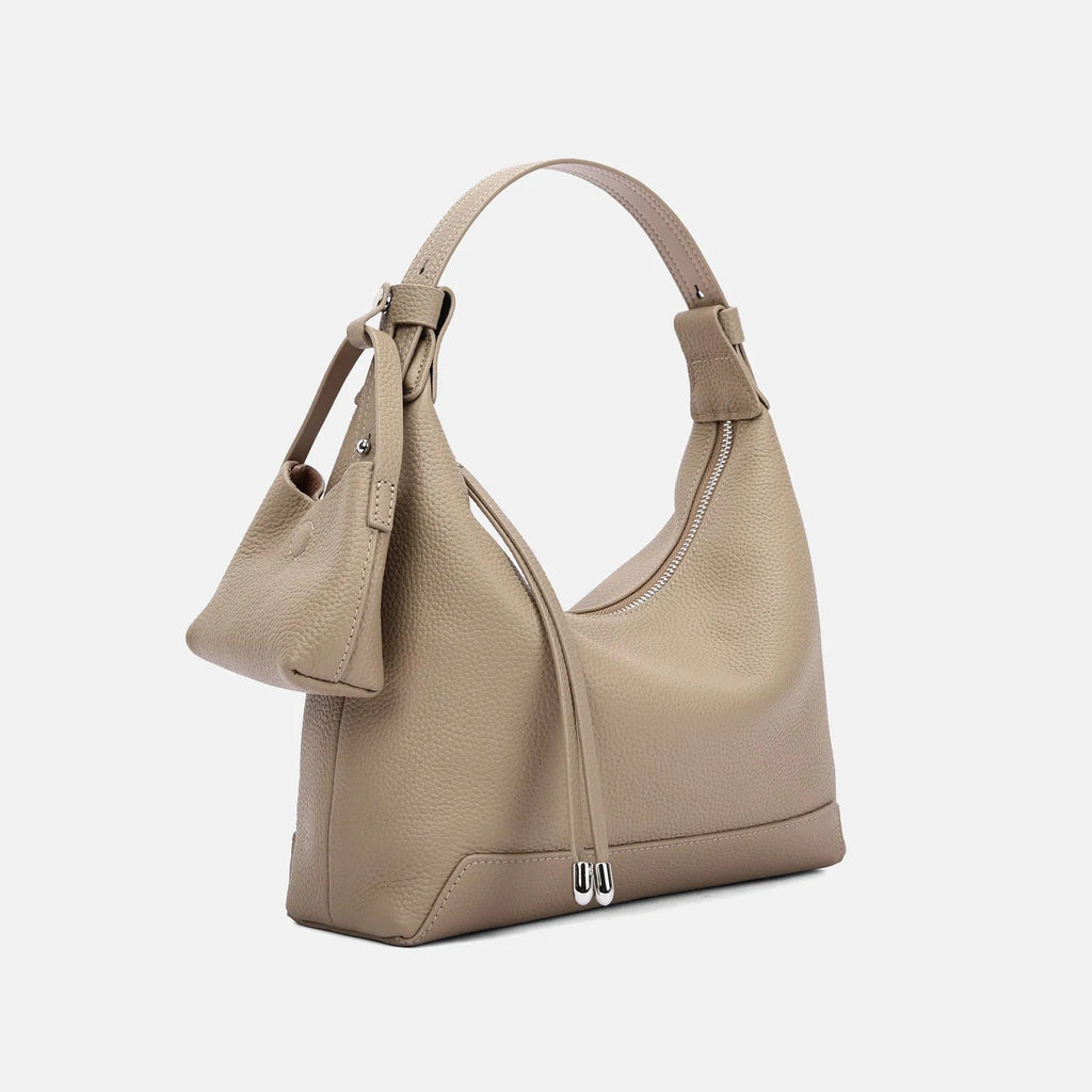 Soft genuine cowhide leather shoulder bag in urban simplicity style with visible sewing thread detailing