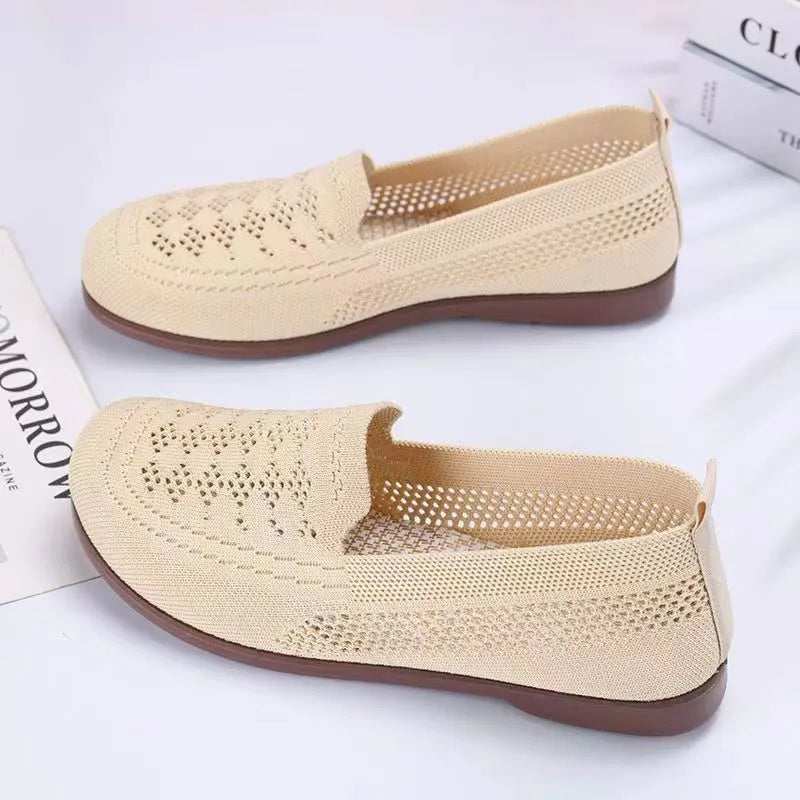 Beige antiskid walking shoes for women with breathable mesh upper and PVC sole