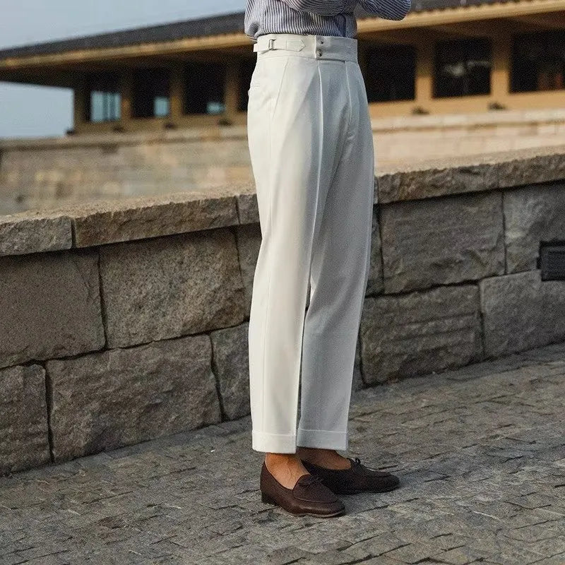 Men's slim fit suit trousers in polyester blend fabric showing straight leg design