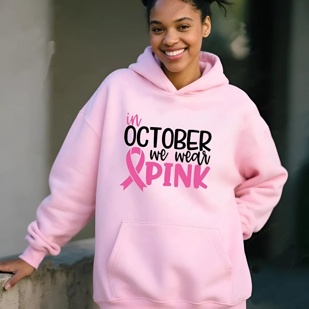 A street fashion pullover hoodie with retro graphic print and side seam pockets, shown in dark blue.