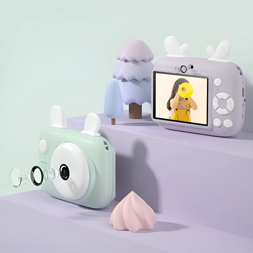 A2 Kids Macaron Mini SLR digital camera in green, showing dual lenses and 2.4-inch screen.