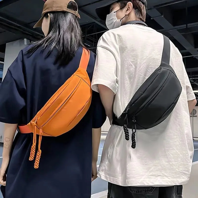 Men's small polyester crossbody chest bag in black nylon lining, 35cm width