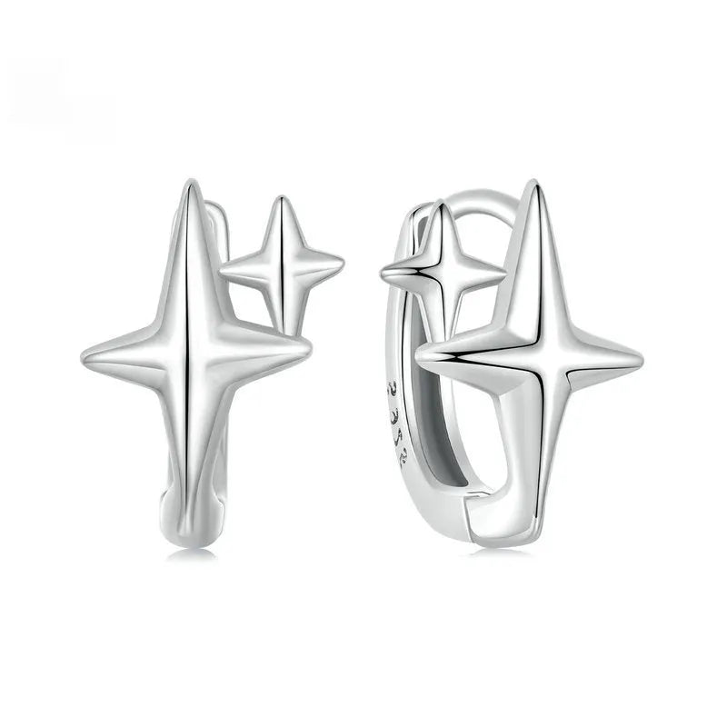 Minimalist star design sterling silver clip earrings with oxidised detailing