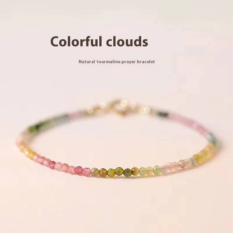 Handmade women's rainbow fluorite bracelet with copper and geometric quadrilateral shape