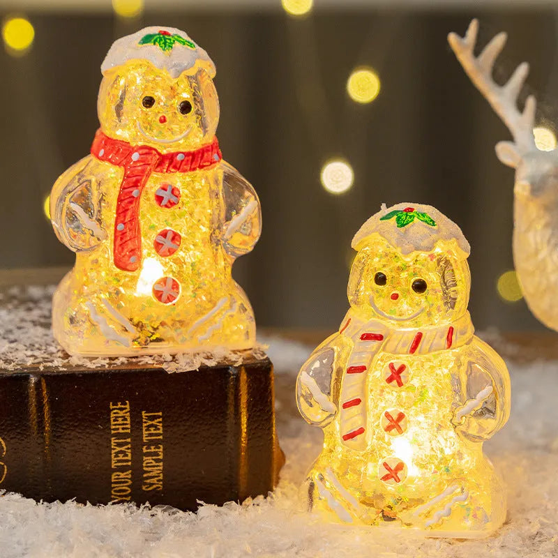 Glowing LED gingerbread man snowman Christmas ornament with a red scarf, measuring 6.5cm by 4cm by 10.5cm.
