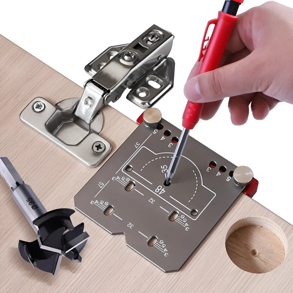 Red aluminium alloy hinge punch locator tool for 35mm cabinet door hinges on a workbench.