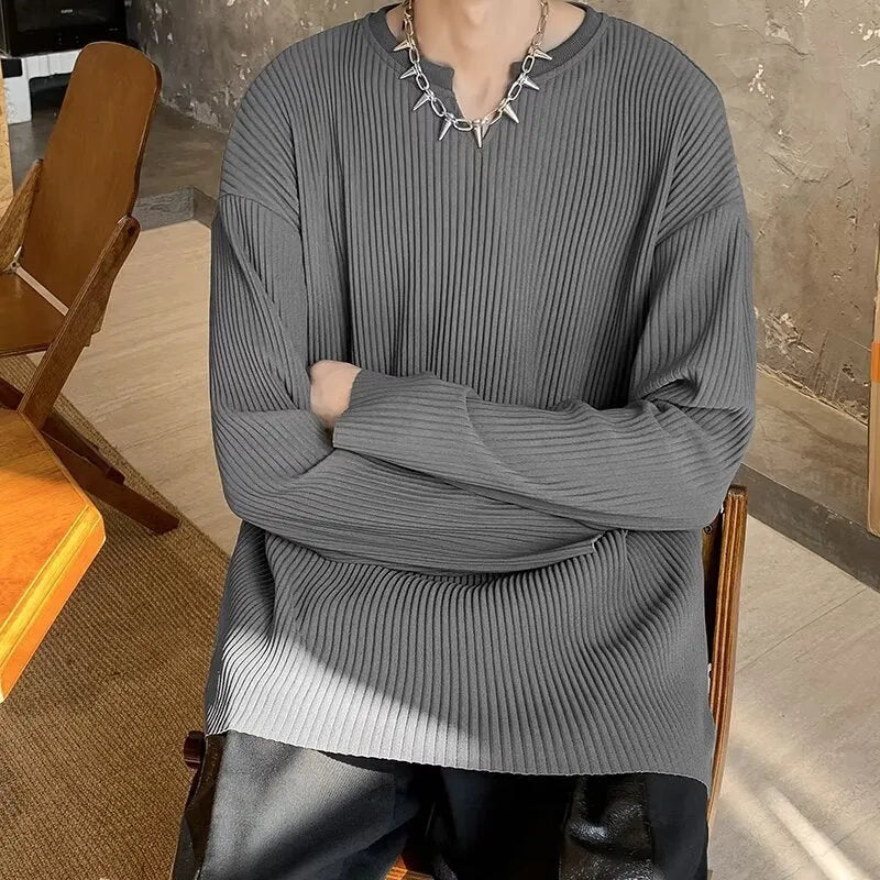 Plus size women's striped texture draping solid colour pullover top in black, loose fit, long sleeves, polyester knit