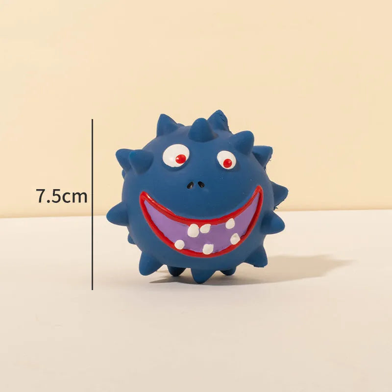 Set of four coloured natural latex squeaky dog balls with cute faces and textured surfaces