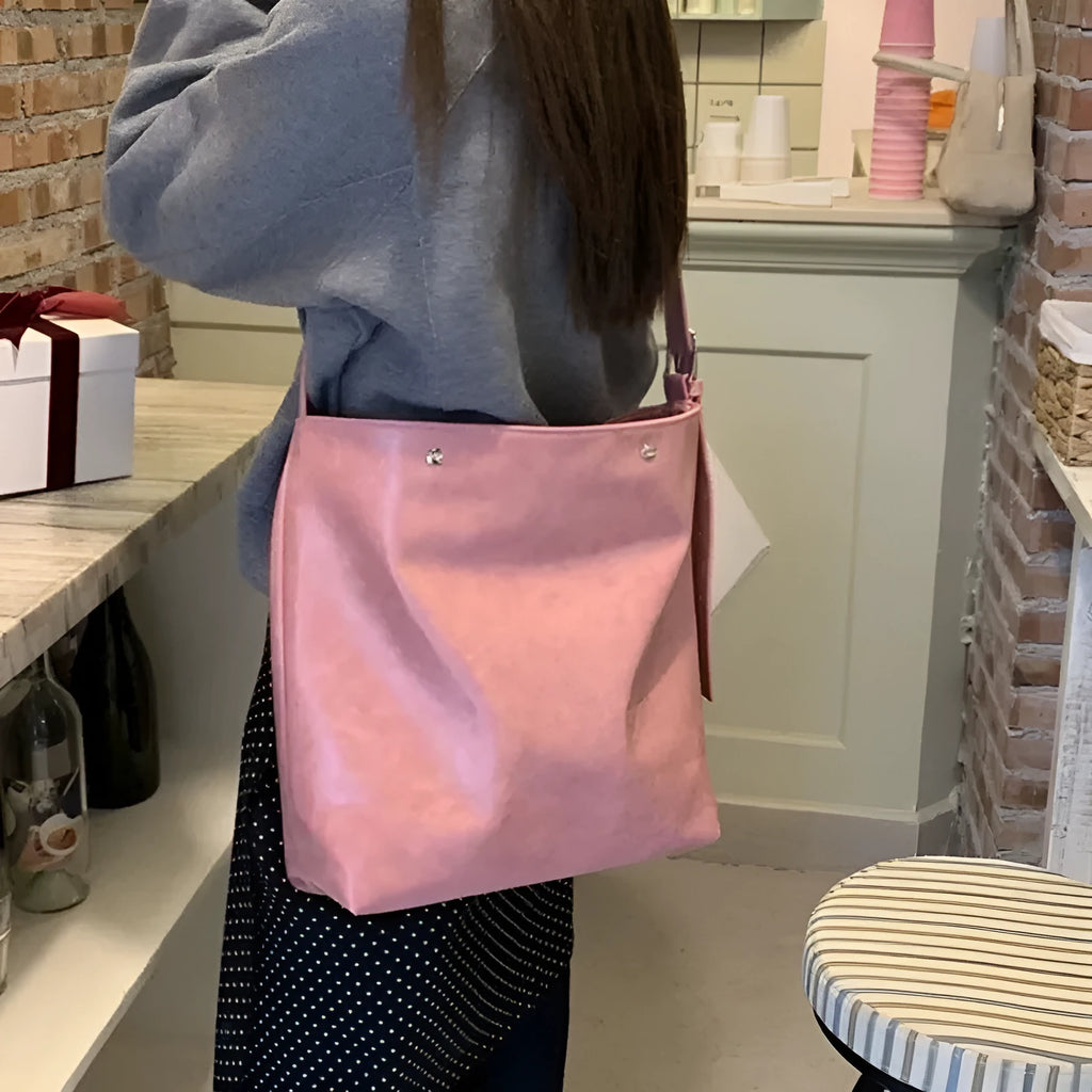 Corduroy one-shoulder commuter bag in pink or brown colour with PU lining