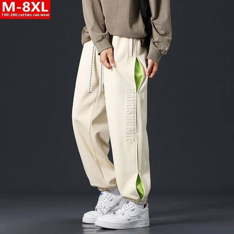 Men's cotton ankle banded pants with collage stitching printing in loose fit design