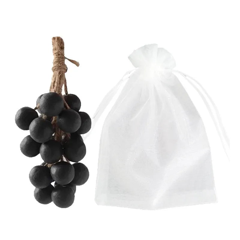 Handmade grape and litchi cleansing soap bars in gift box and mesh bag packaging.