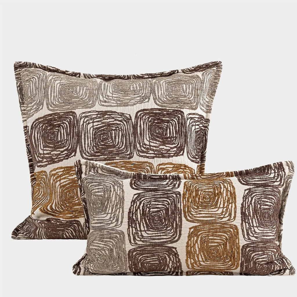 Square cream and coffee abstract coil pillow cover made of feather velvet polyester in 50x50cm or 30x50cm size.