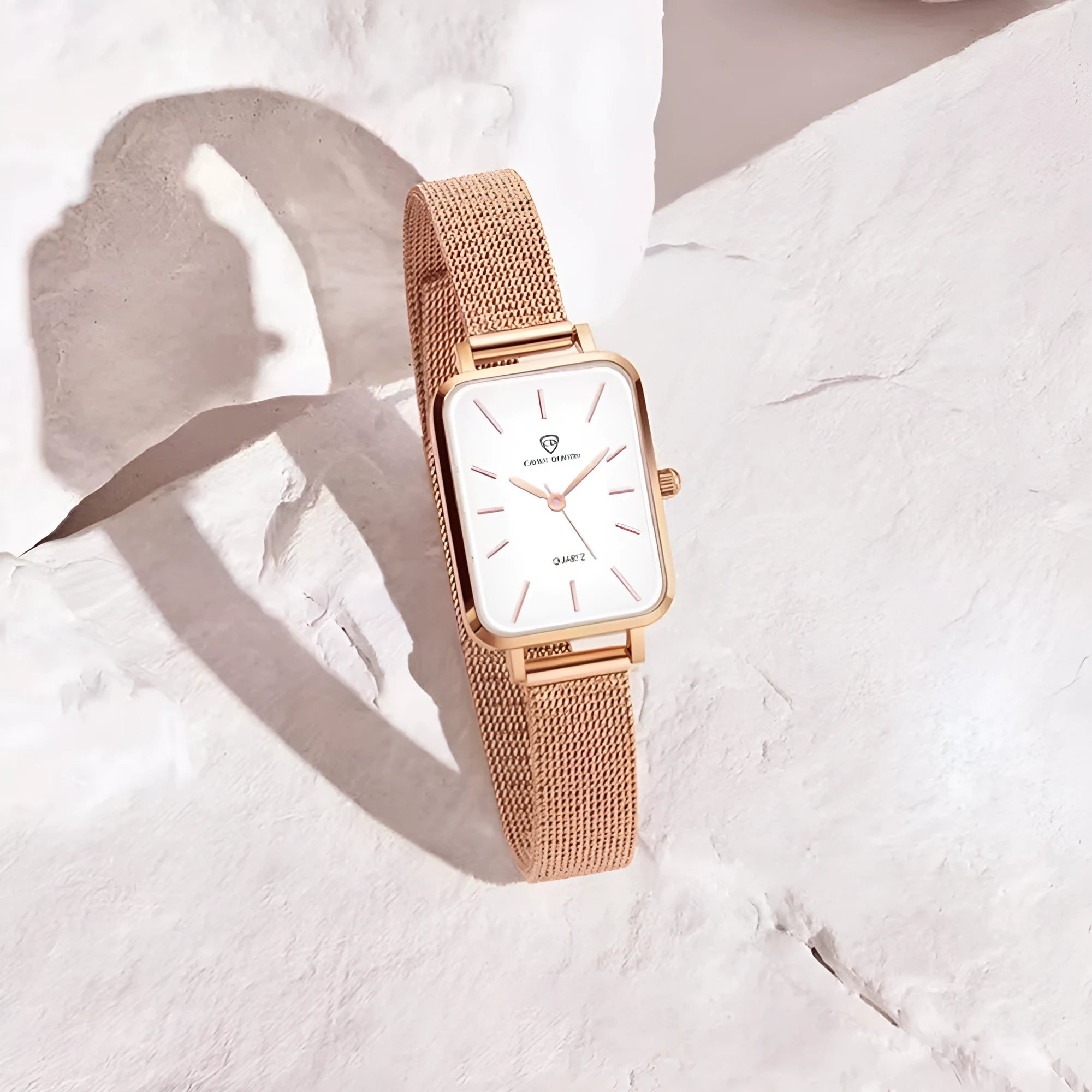Women's waterproof quartz watch with alloy case and woven steel strap in rose gold or silver colour