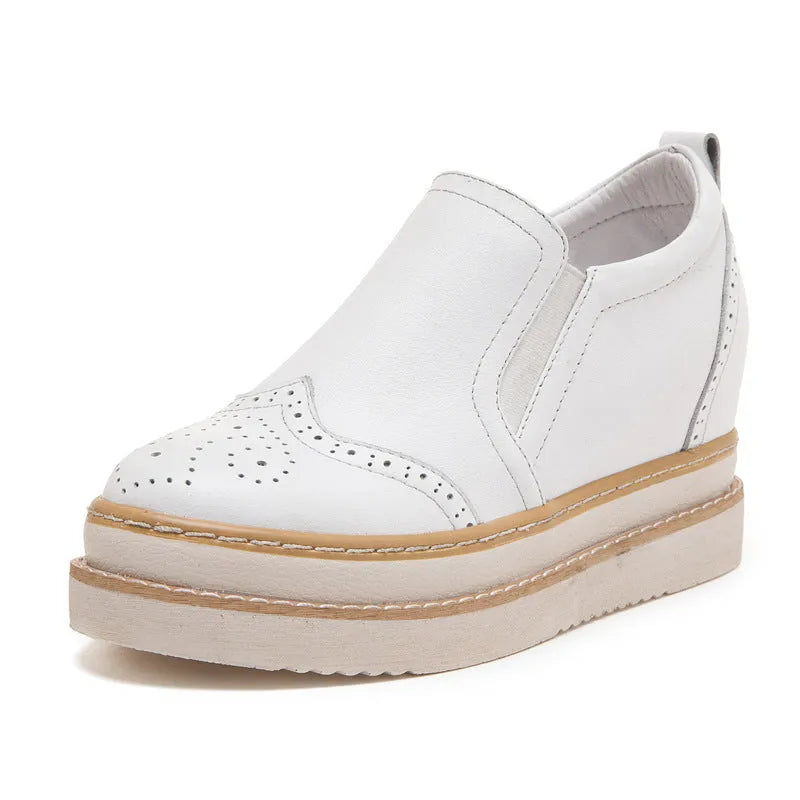 Women's genuine leather brogue platform shoes with metal detail and round toe in black
